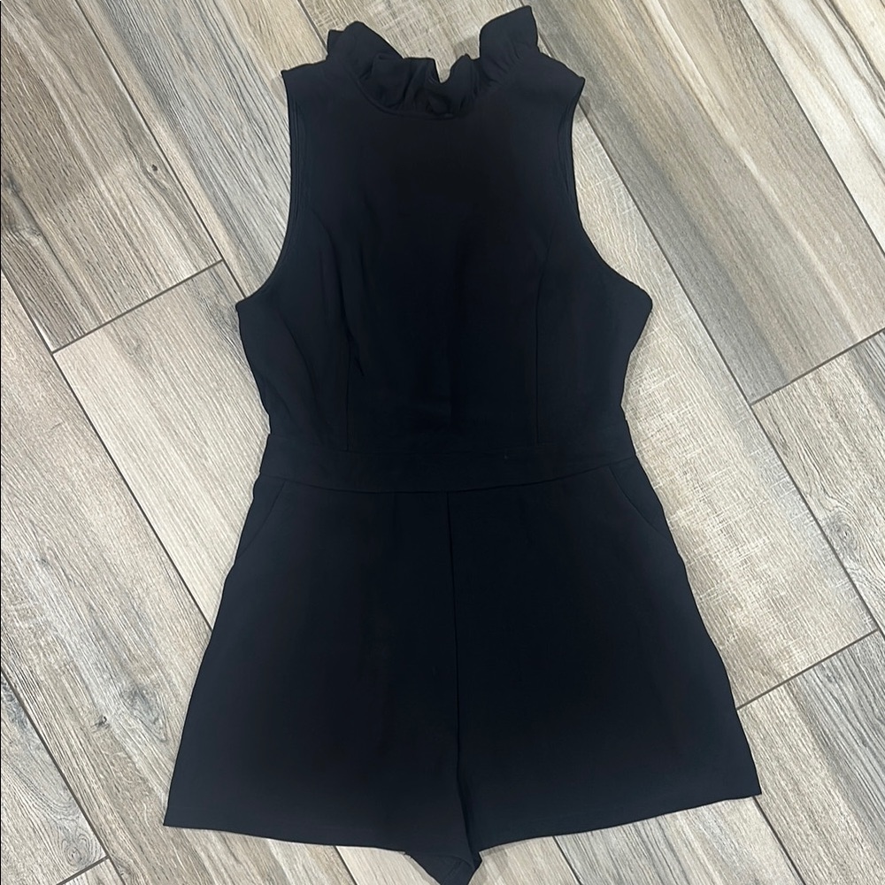 Black Sleeveless Ruffle Neck Romper
